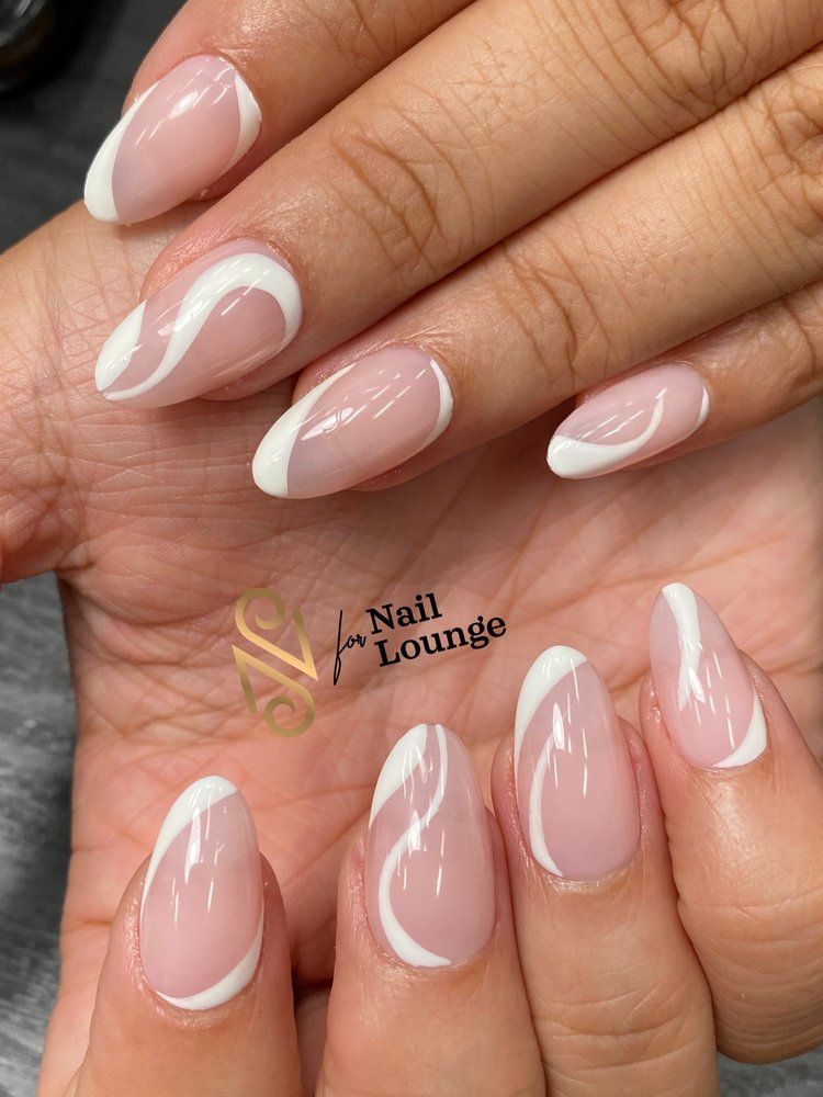 White swirl French tips on almond nails